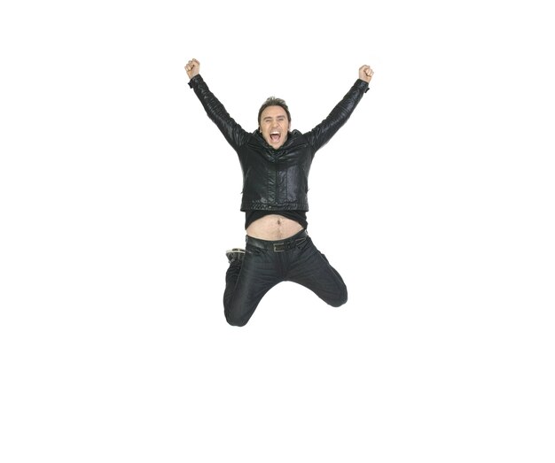 Happy man with leather jacket jumping