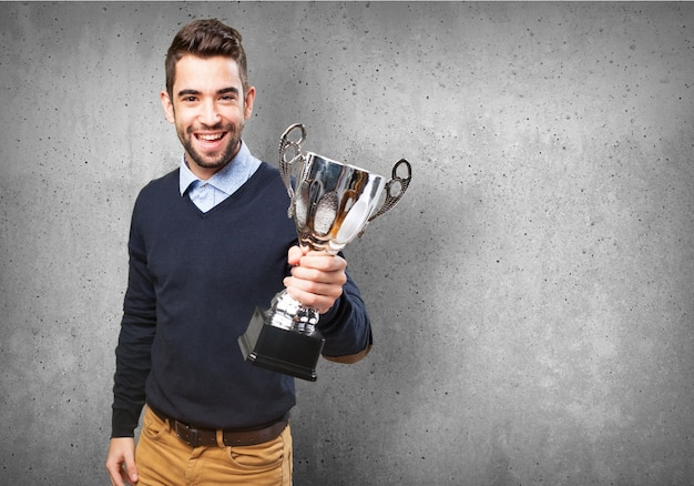 Happy man with a trophy