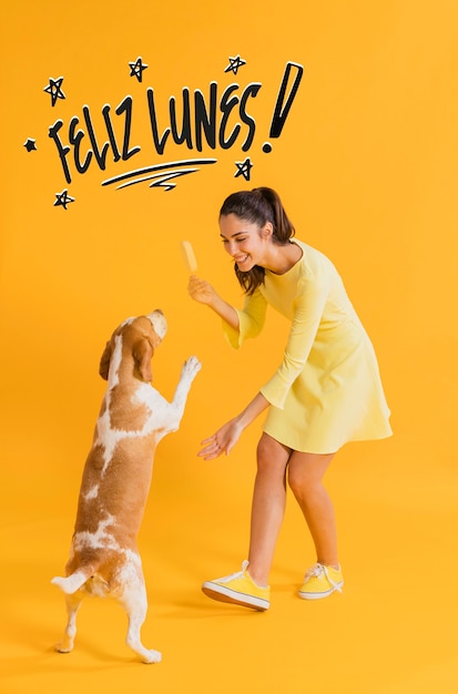 Free photo happy monday concept with woman and dog