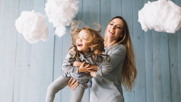 Free photo happy mother and daughter celebrating mothers day together