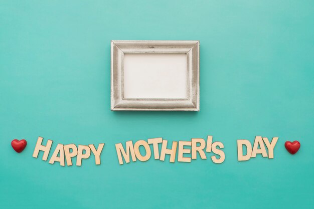 "happy mother's day" lettering with frame and hearts