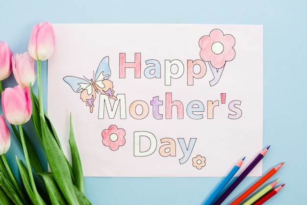 Happy Mothers Day drawing on paper with tulips and pencils