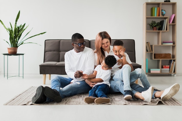 Free photo happy multicultural family having fun together