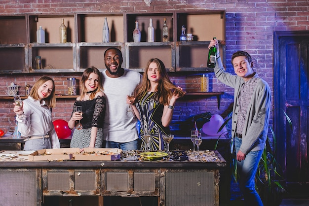 Free Photo happy people having party on kitchen