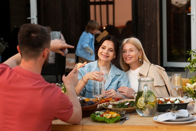 Happy people sitting at table