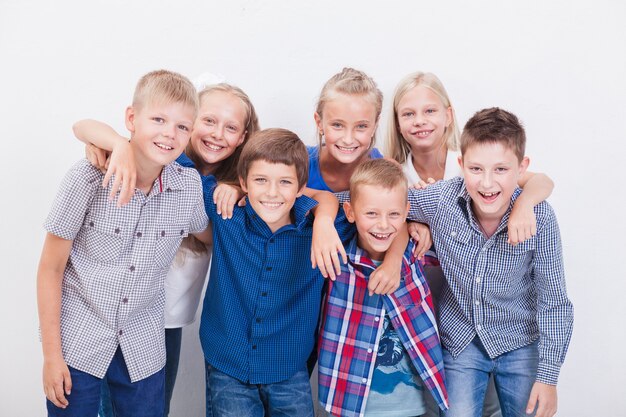 The  happy smiling teenagers on white background.