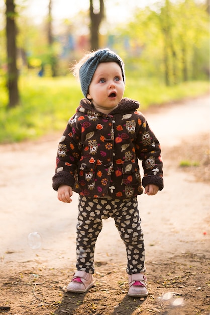 Happy and surprised boy in nature