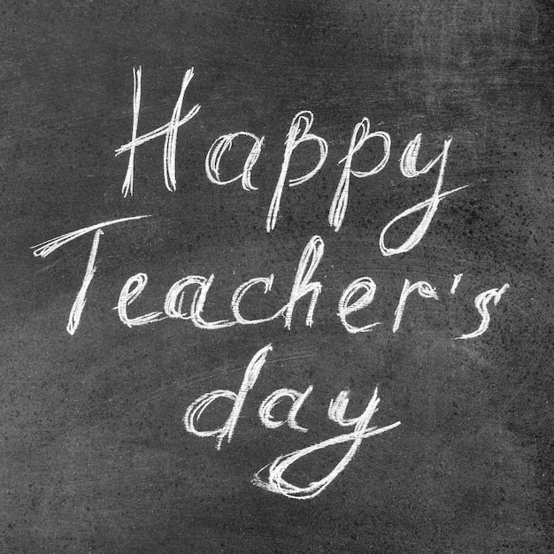 Free photo happy teacher's day chalk lettering