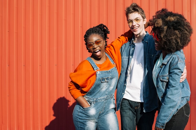 Happy teenagers posing together outdoors