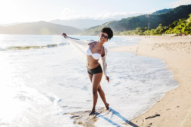 Happy woman at the beach