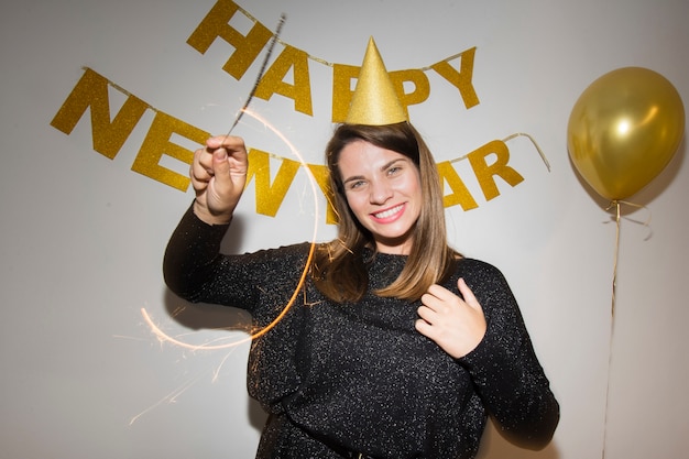 Free photo happy woman celebrating new year