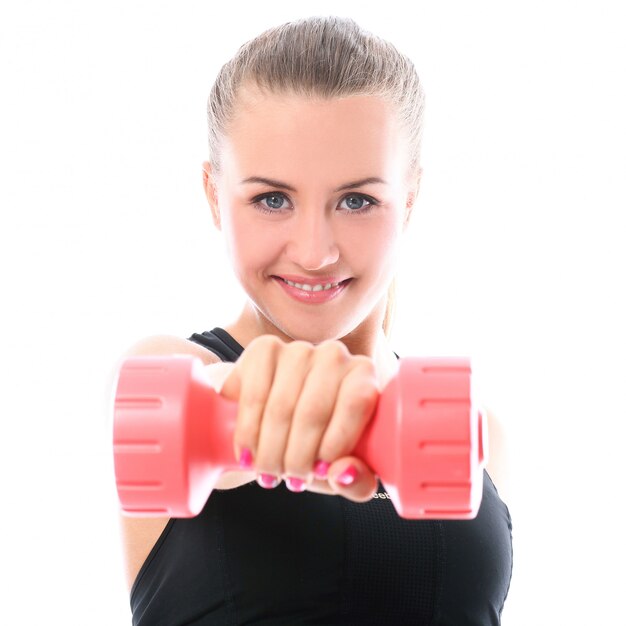 Free Photo happy woman doing exercises with dumbbells