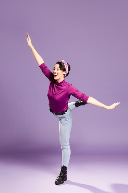 Free Photo happy woman fooling around in a studio