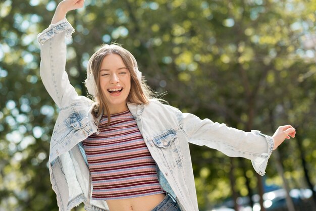 Happy woman listening to music