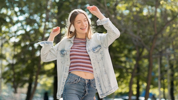 Happy woman listening to music