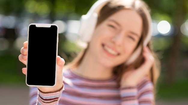 Free Photo happy woman listening to music