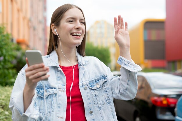 Happy woman listening to music