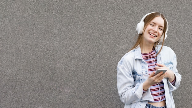 Happy woman listening to music