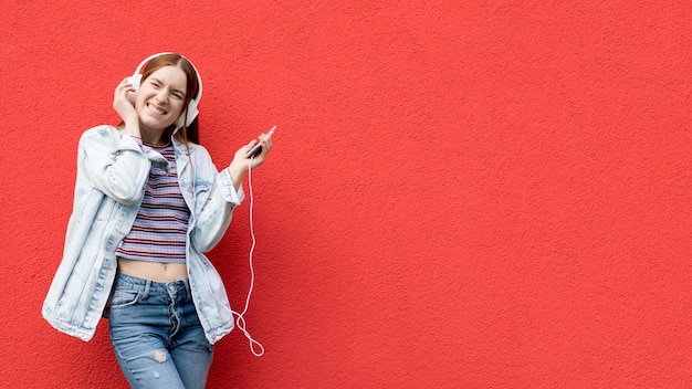 Happy woman listening to music