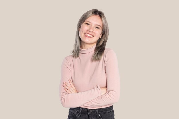 Happy woman in a pink turtleneck