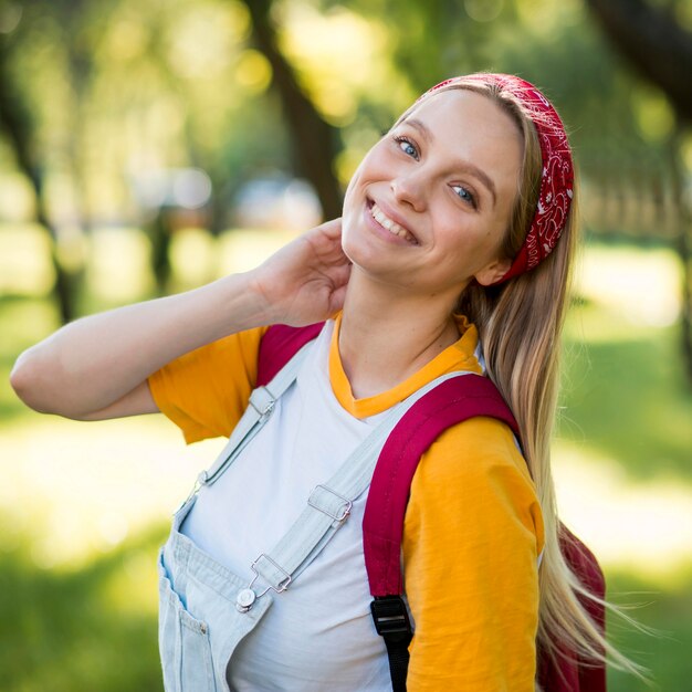 Happy woman posing outdoors