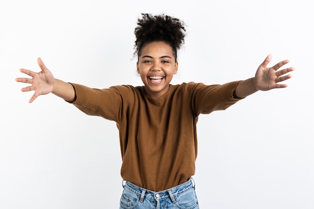 Happy woman posing with arms wide open