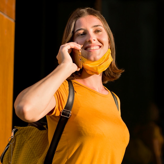 Happy woman talking on the phone