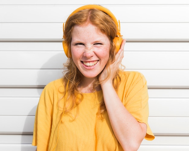 Free Photo happy woman wearing headphones