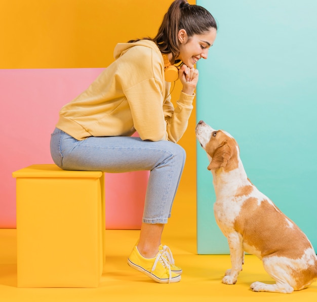 Free Photo happy woman with a dog