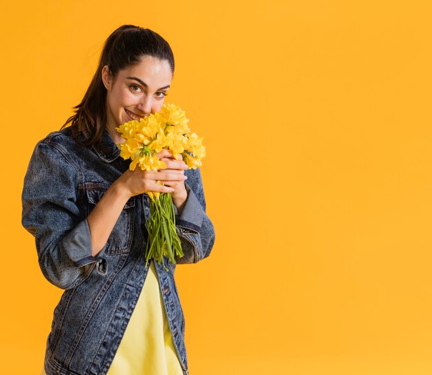 Happy woman with flower bouquet