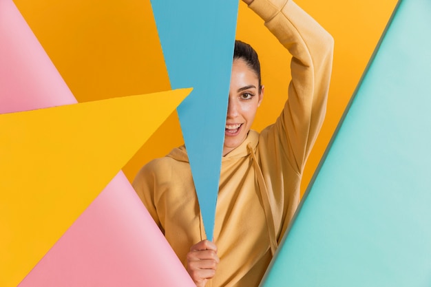 Free Photo happy woman with geometric shapes