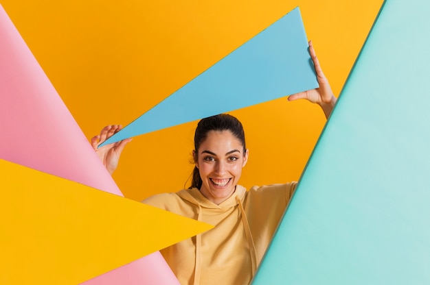 Happy woman with geometric shapes