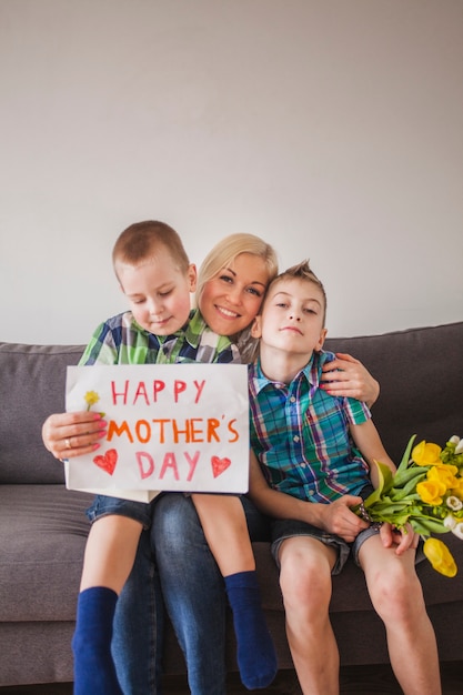 Happy woman with her children on mother's day