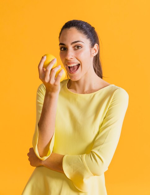 Happy woman with lemons