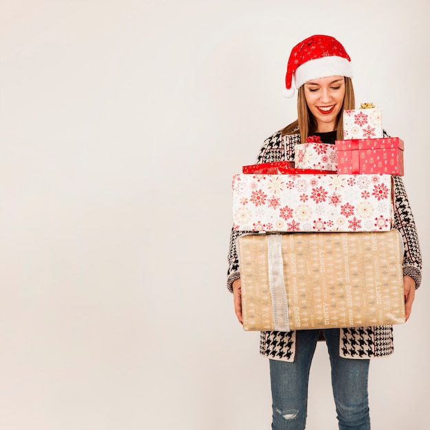 Free photo happy woman with many presents