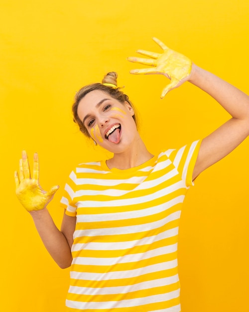 Happy woman with painted hands