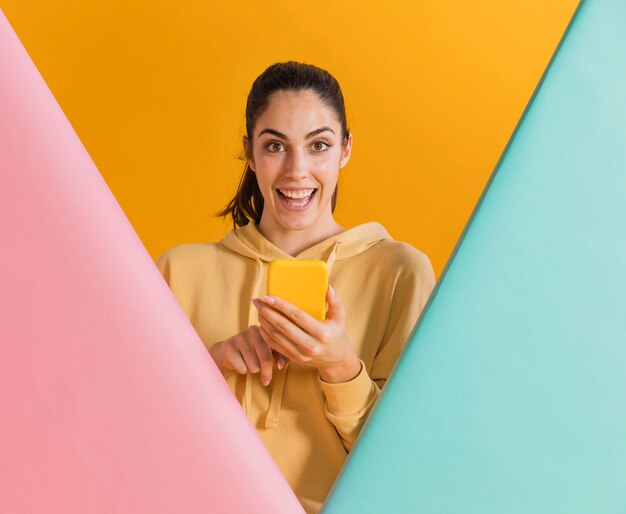 Happy woman with a smartphone