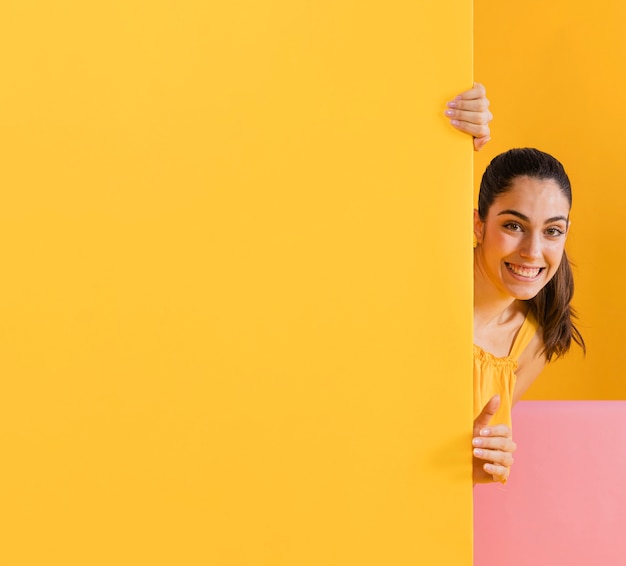 Happy woman in yellow dress