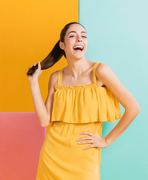 Happy woman in yellow dress