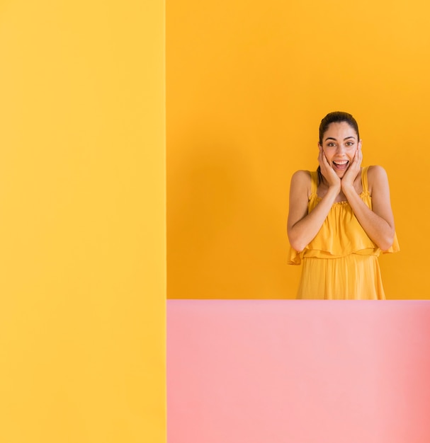 Free photo happy woman in yellow dress