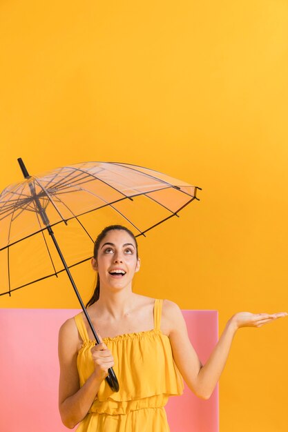 Happy woman in yellow dress