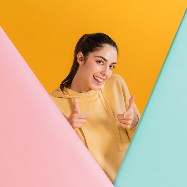 Happy woman in a yellow sweater