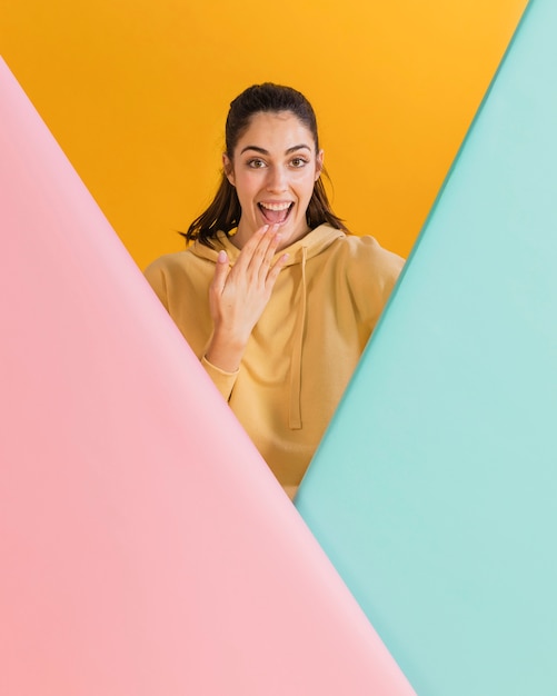 Happy woman in a yellow sweater