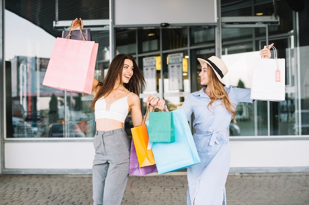 Free photo happy women after shopping