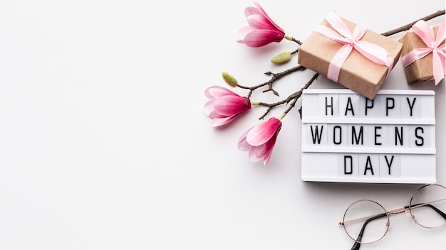 Free photo happy women's day lettering on white background with copy space