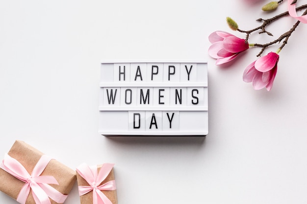 Free photo happy women's day lettering on white background