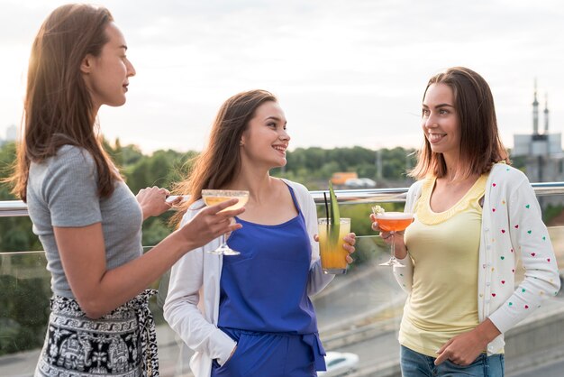 Happy women at a terrace party