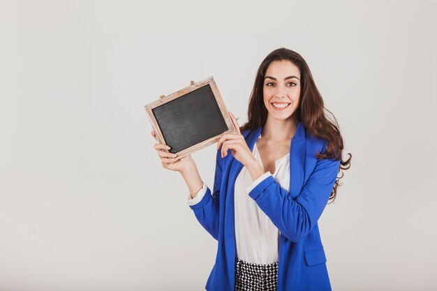 Happy worker with blue jacket and slate