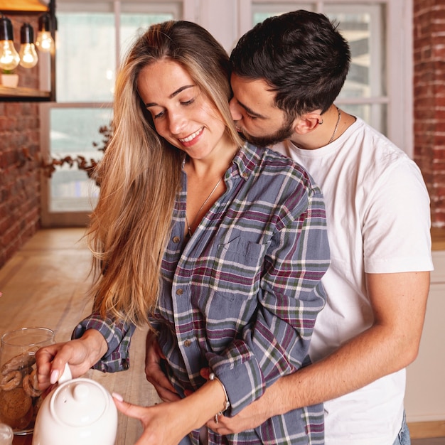 Happy young couple having breakfast