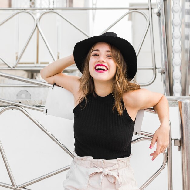 Happy young girl in the amusement park